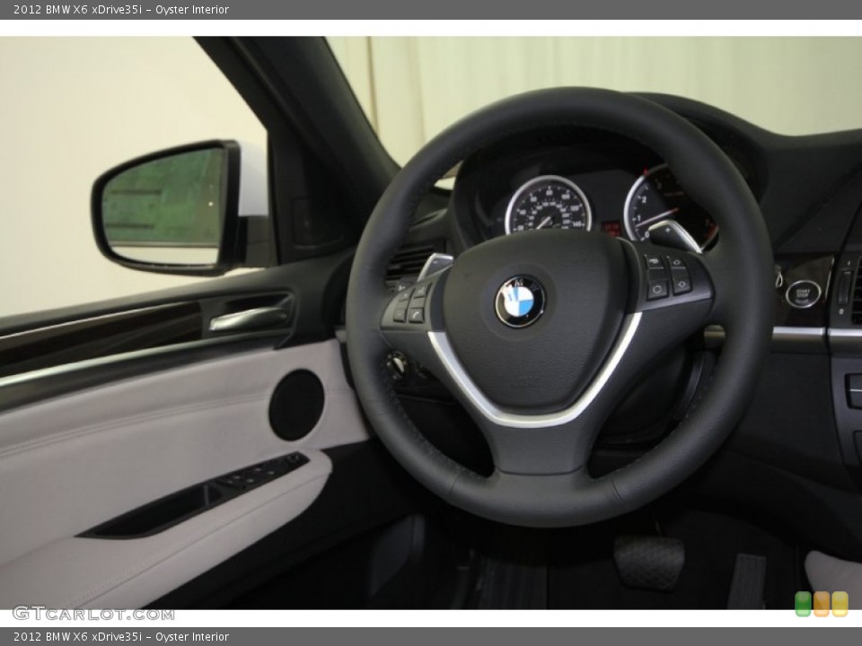 Oyster Interior Steering Wheel for the 2012 BMW X6 xDrive35i #58624793