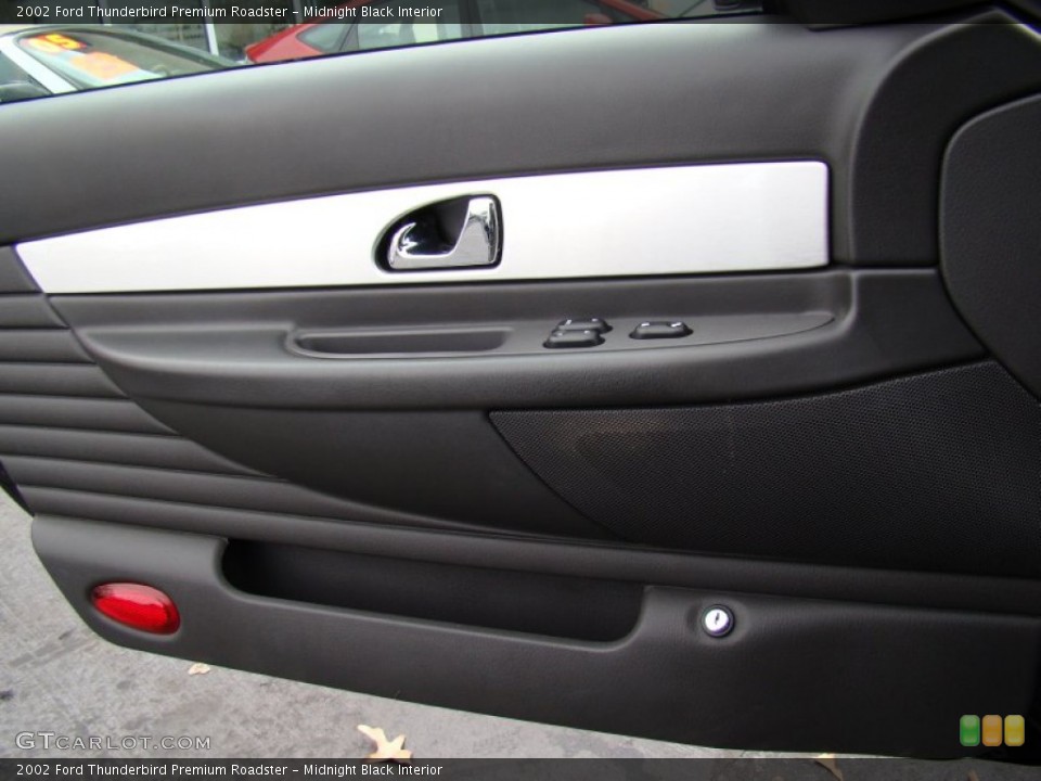 Midnight Black Interior Door Panel for the 2002 Ford Thunderbird Premium Roadster #58645205