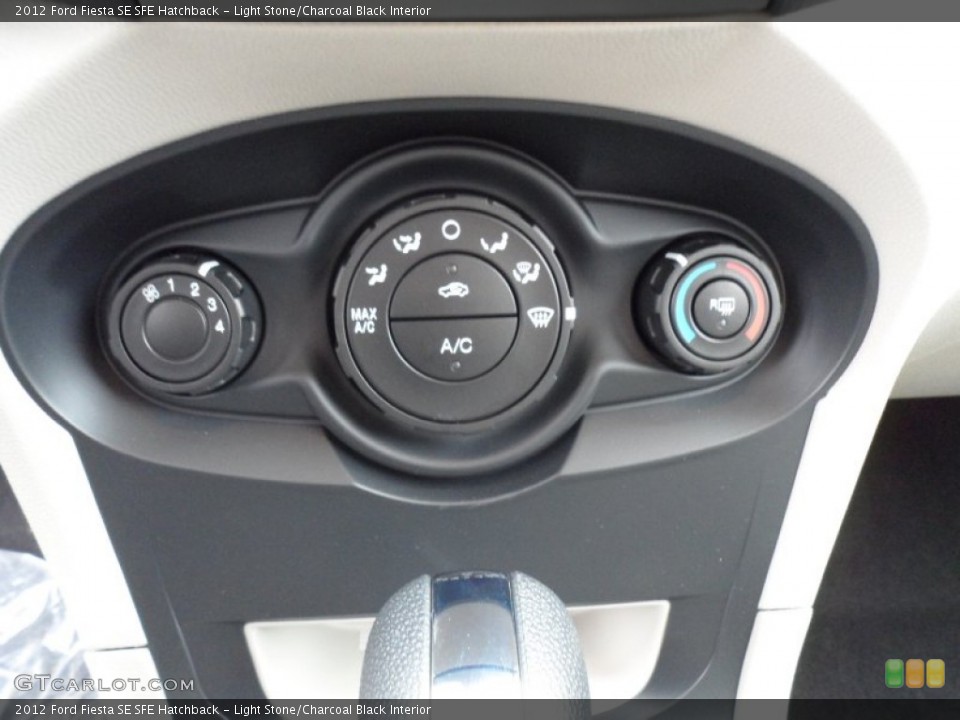 Light Stone/Charcoal Black Interior Controls for the 2012 Ford Fiesta SE SFE Hatchback #58658300