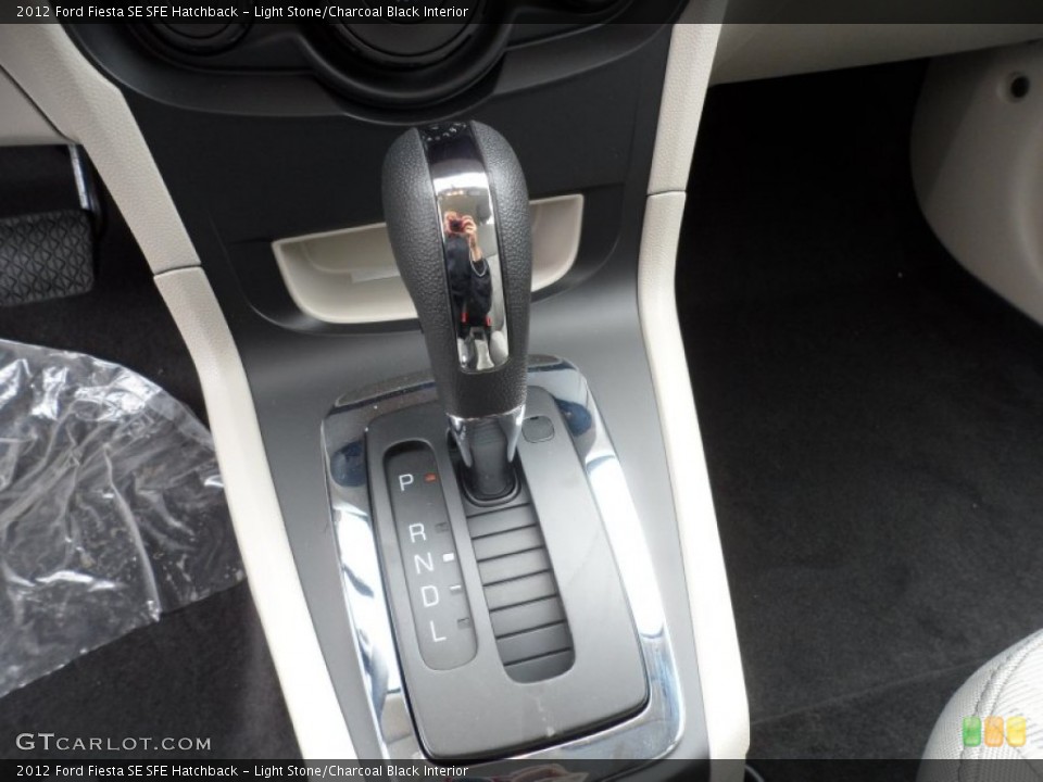 Light Stone/Charcoal Black Interior Transmission for the 2012 Ford Fiesta SE SFE Hatchback #58658309