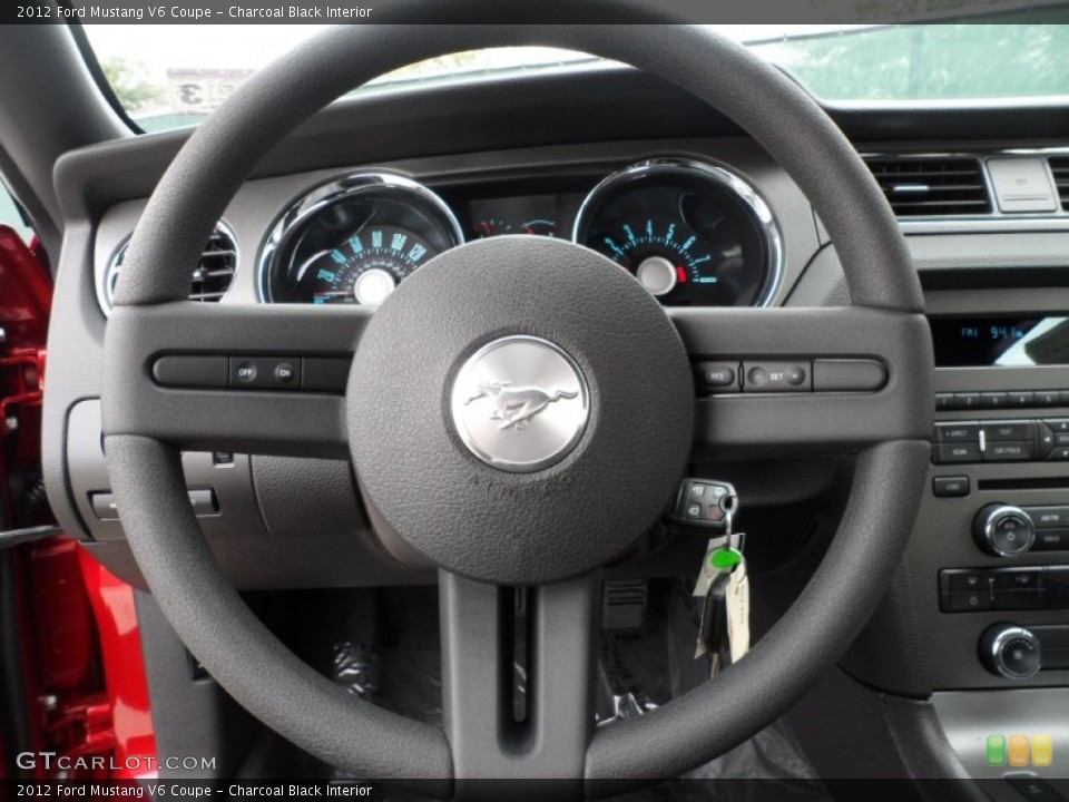 Charcoal Black Interior Steering Wheel for the 2012 Ford Mustang V6 Coupe #58660373