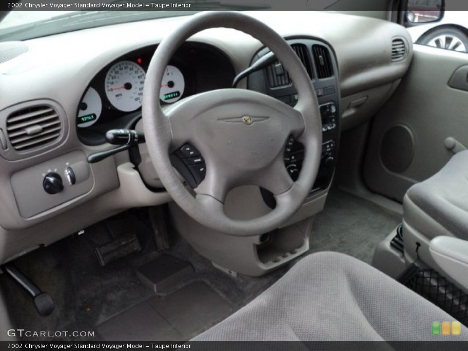 Taupe Interior Dashboard for the 2002 Chrysler Voyager  #58748688
