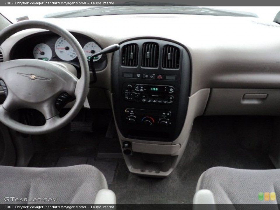 Taupe Interior Dashboard for the 2002 Chrysler Voyager  #58748733