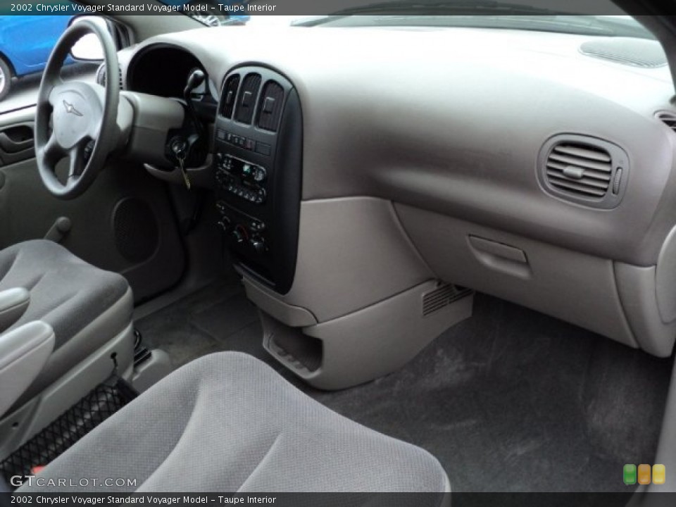 Taupe Interior Dashboard for the 2002 Chrysler Voyager  #58748778