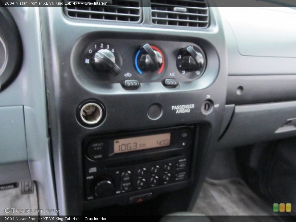Gray Interior Controls for the 2004 Nissan Frontier XE V6 King Cab 4x4 #58860847