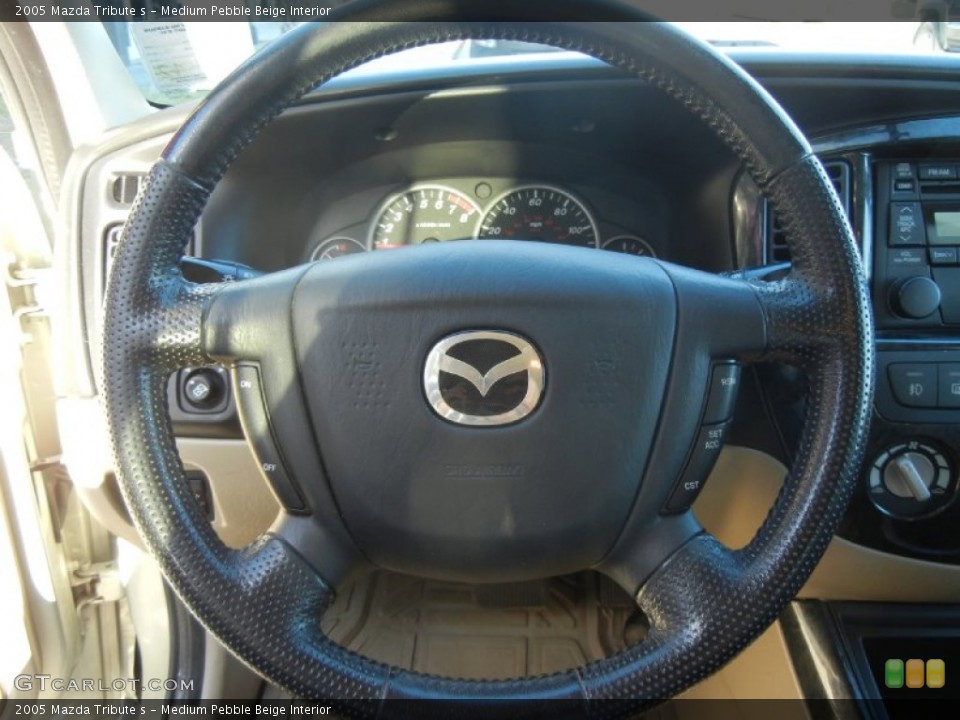 Medium Pebble Beige Interior Steering Wheel for the 2005 Mazda Tribute s #58863145
