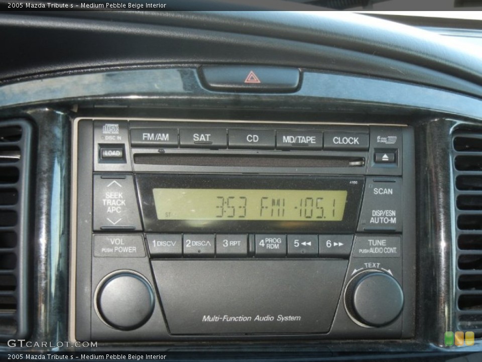 Medium Pebble Beige Interior Audio System for the 2005 Mazda Tribute s #58863181
