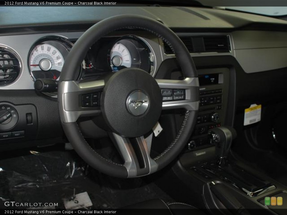 Charcoal Black Interior Steering Wheel for the 2012 Ford Mustang V6 Premium Coupe #58878909