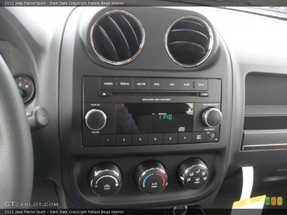 Dark Slate Gray/Light Pebble Beige Interior Controls for the 2012 Jeep Patriot Sport #58894272