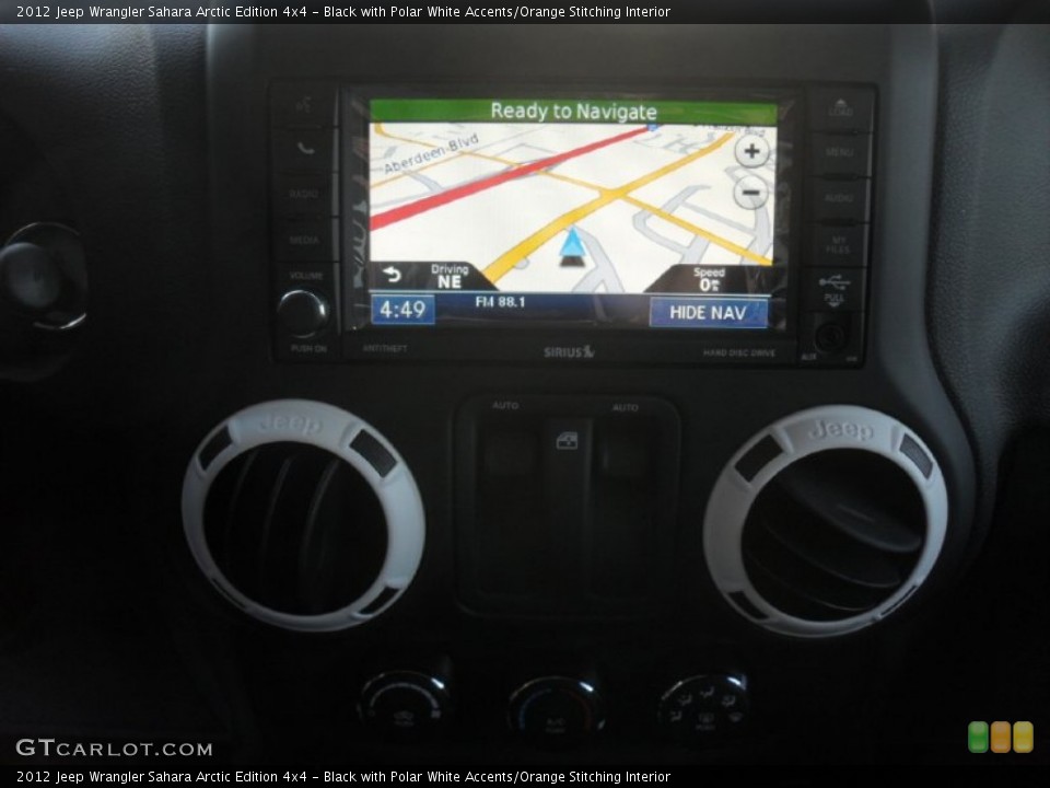 Black with Polar White Accents/Orange Stitching Interior Navigation for the 2012 Jeep Wrangler Sahara Arctic Edition 4x4 #58912258