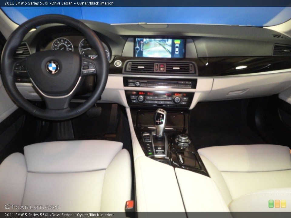 Oyster/Black Interior Dashboard for the 2011 BMW 5 Series 550i xDrive Sedan #58984527