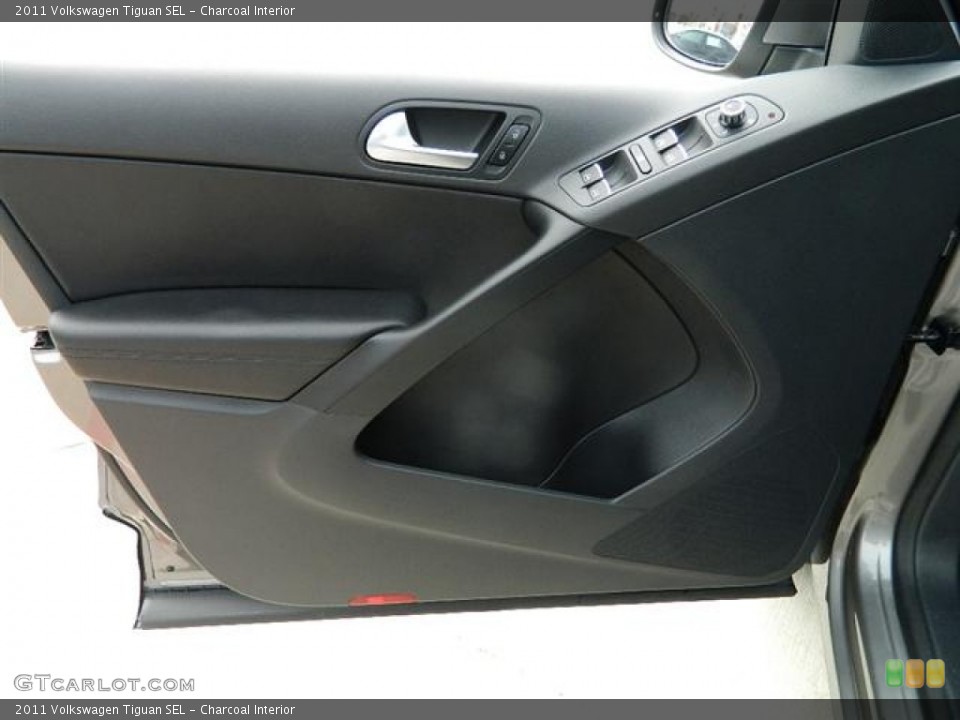 Charcoal Interior Door Panel for the 2011 Volkswagen Tiguan SEL #59006844