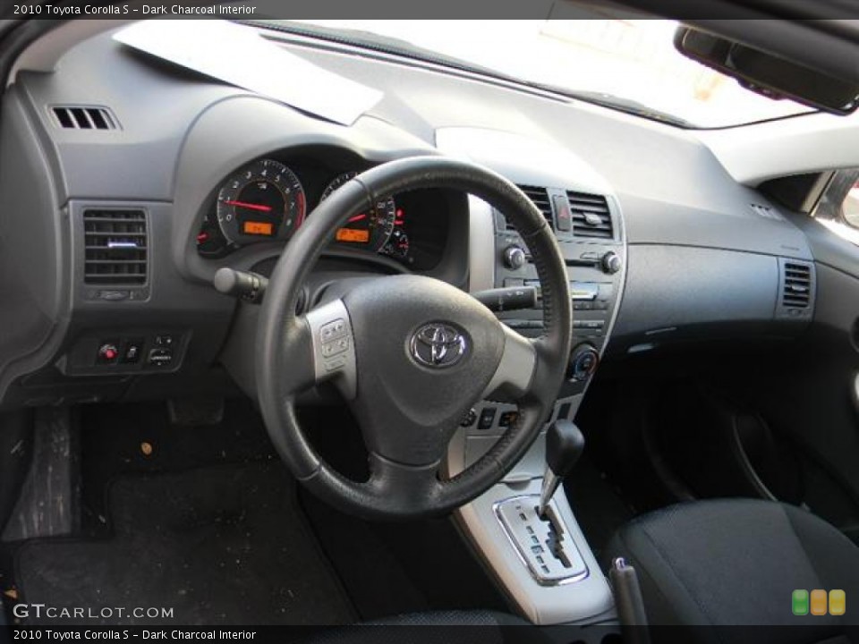 Dark Charcoal Interior Dashboard for the 2010 Toyota Corolla S #59014052