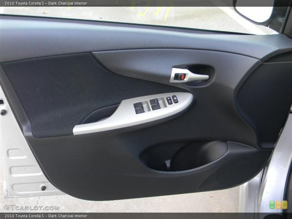 Dark Charcoal Interior Door Panel for the 2010 Toyota Corolla S #59014061