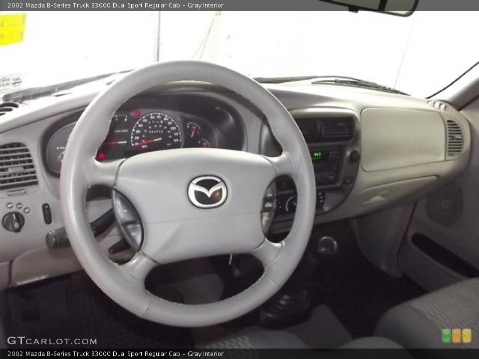 Gray Interior Dashboard for the 2002 Mazda B-Series Truck B3000 Dual Sport Regular Cab #59016236