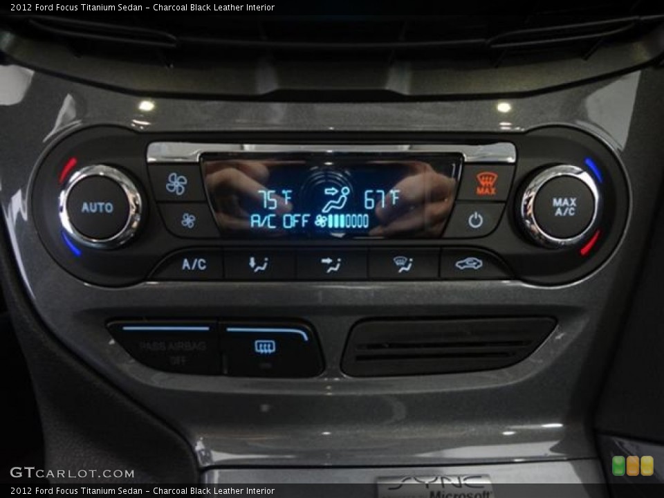 Charcoal Black Leather Interior Controls for the 2012 Ford Focus Titanium Sedan #59017808