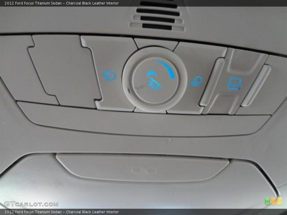 Charcoal Black Leather Interior Controls for the 2012 Ford Focus Titanium Sedan #59017838