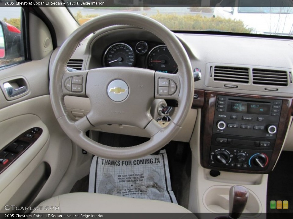 Neutral Beige Interior Dashboard for the 2005 Chevrolet Cobalt LT Sedan #59050427