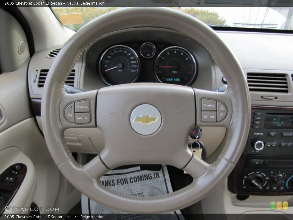 Neutral Beige Interior Steering Wheel for the 2005 Chevrolet Cobalt LT Sedan #59050439