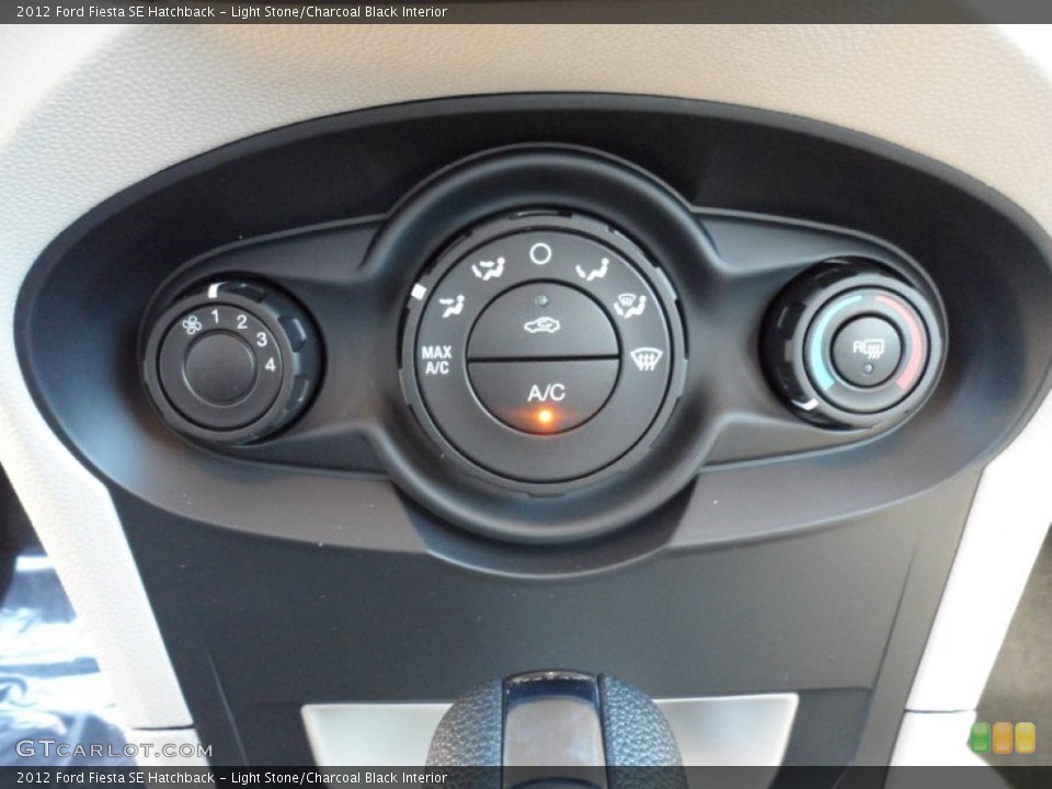 Light Stone/Charcoal Black Interior Controls for the 2012 Ford Fiesta SE Hatchback #59052063