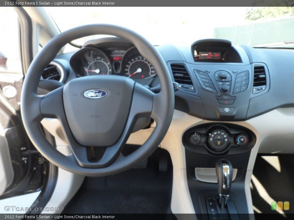 Light Stone/Charcoal Black Interior Dashboard for the 2012 Ford Fiesta S Sedan #59052158