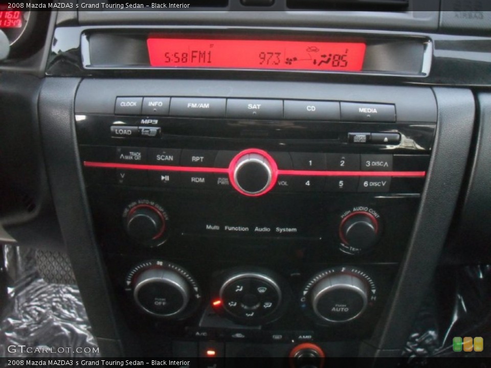 Black Interior Controls for the 2008 Mazda MAZDA3 s Grand Touring Sedan #59058926