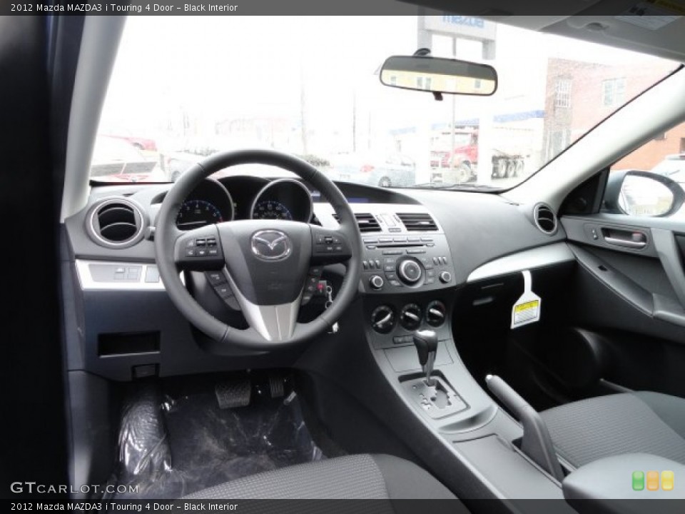 Black Interior Dashboard for the 2012 Mazda MAZDA3 i Touring 4 Door #59069636
