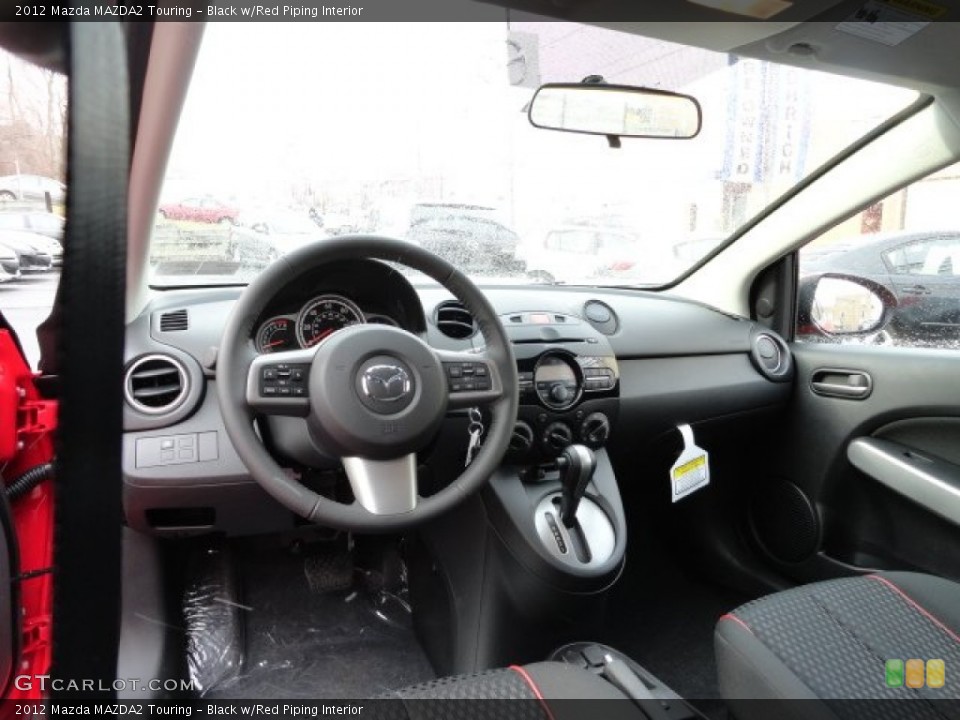 Black w/Red Piping Interior Photo for the 2012 Mazda MAZDA2 Touring #59070347