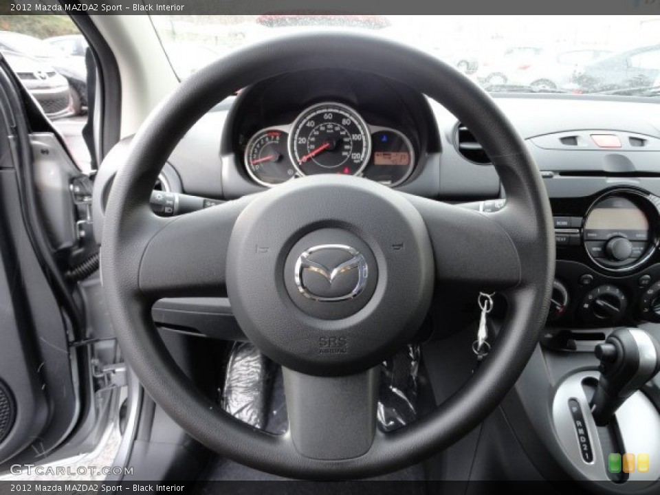 Black Interior Steering Wheel for the 2012 Mazda MAZDA2 Sport #59070560