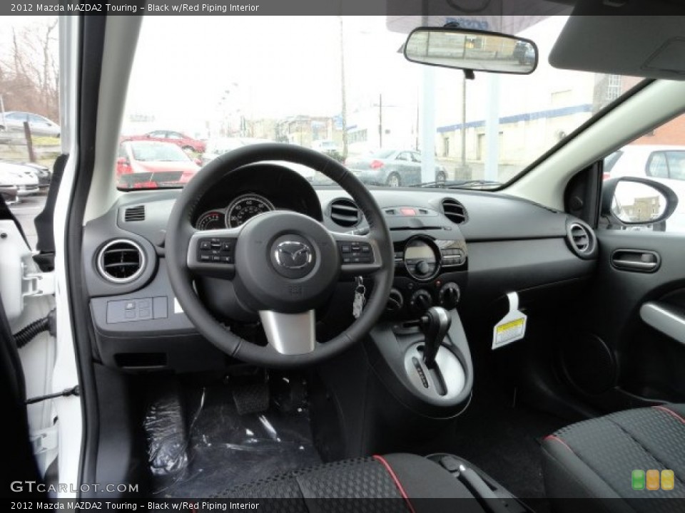 Black w/Red Piping Interior Photo for the 2012 Mazda MAZDA2 Touring #59070692