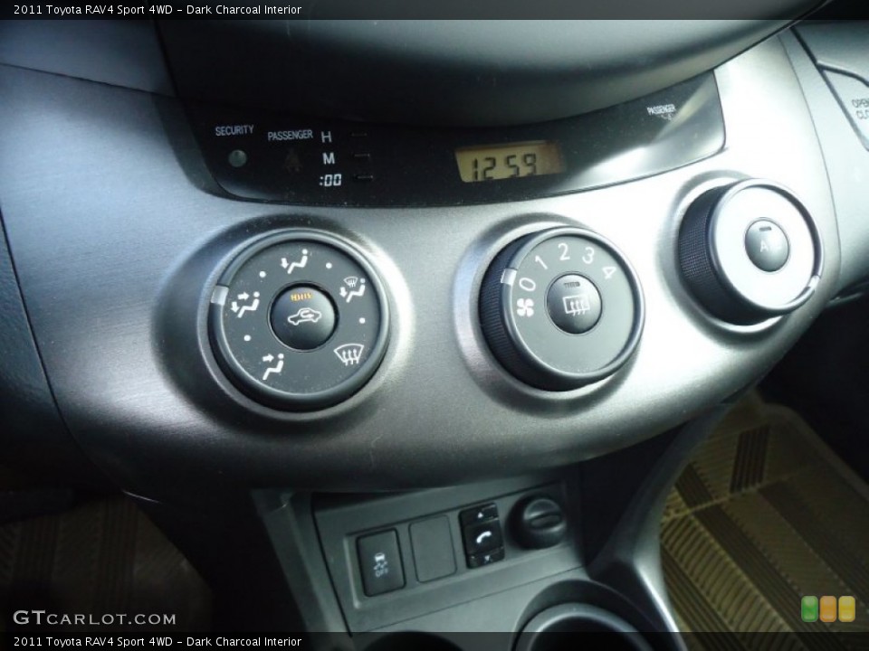 Dark Charcoal Interior Controls for the 2011 Toyota RAV4 Sport 4WD #59091997