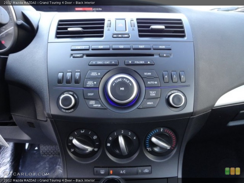 Black Interior Controls for the 2012 Mazda MAZDA3 i Grand Touring 4 Door #59228346