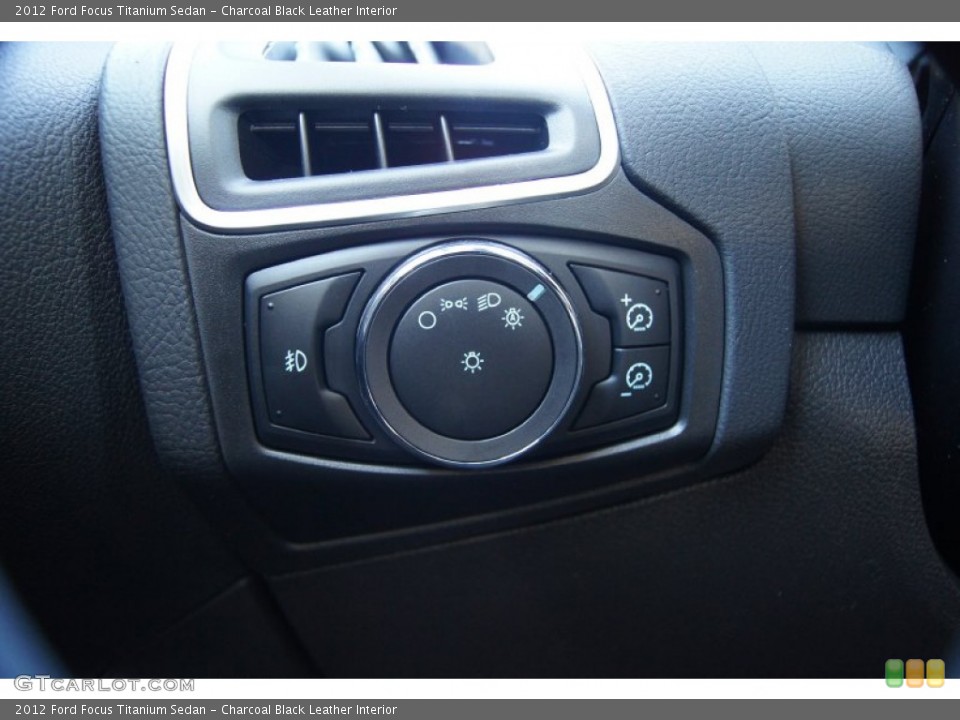 Charcoal Black Leather Interior Controls for the 2012 Ford Focus Titanium Sedan #59250754