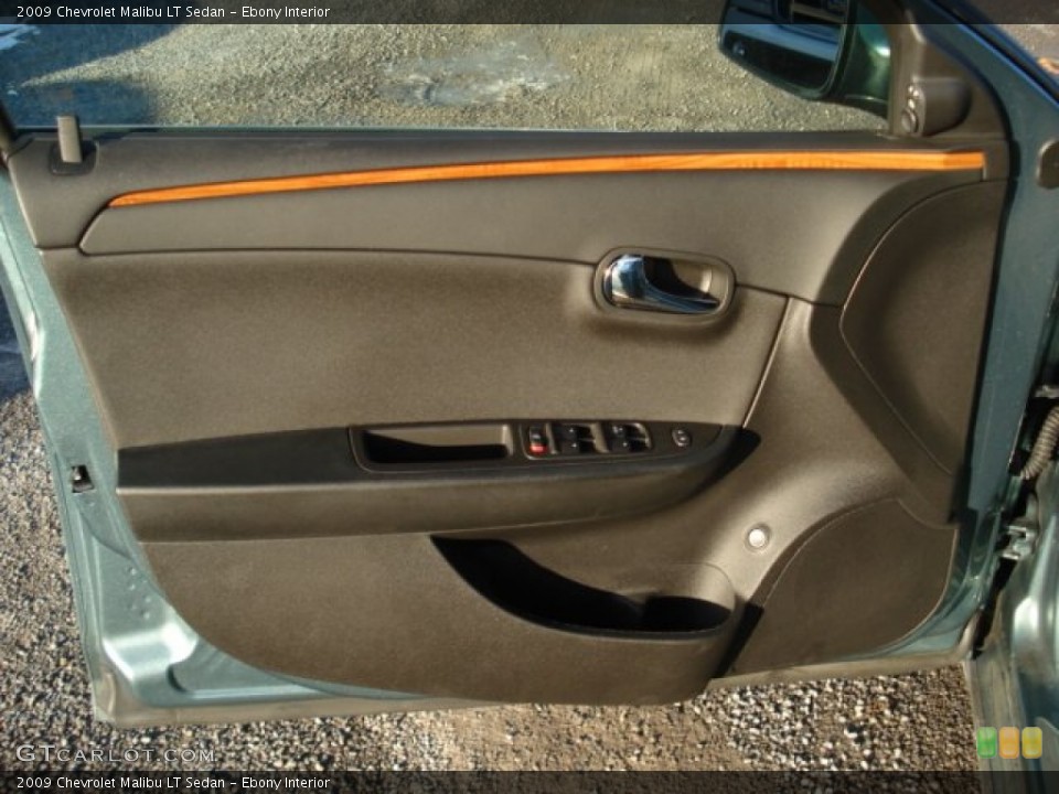 Ebony Interior Door Panel for the 2009 Chevrolet Malibu LT Sedan #59281947