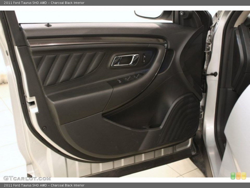 Charcoal Black Interior Door Panel for the 2011 Ford Taurus SHO AWD #59318513