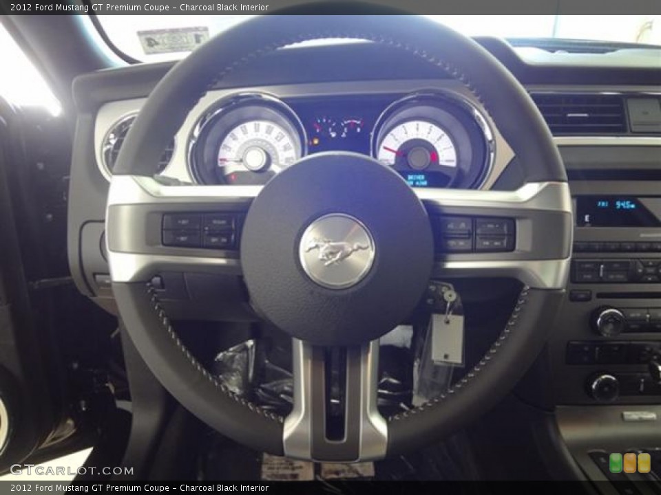 Charcoal Black Interior Steering Wheel for the 2012 Ford Mustang GT Premium Coupe #59361473