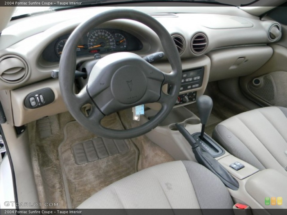 Taupe Interior Prime Interior for the 2004 Pontiac Sunfire Coupe #59368179