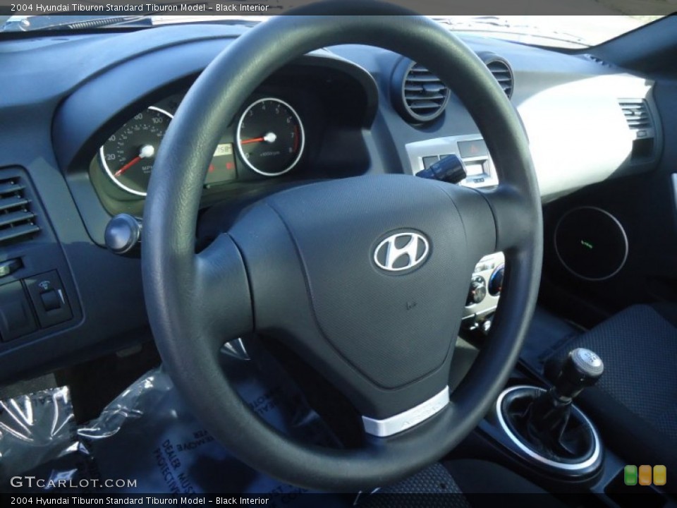 Black Interior Steering Wheel for the 2004 Hyundai Tiburon  #59377670