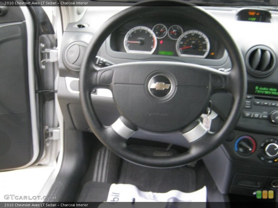 Charcoal Interior Steering Wheel for the 2010 Chevrolet Aveo LT Sedan #59388415