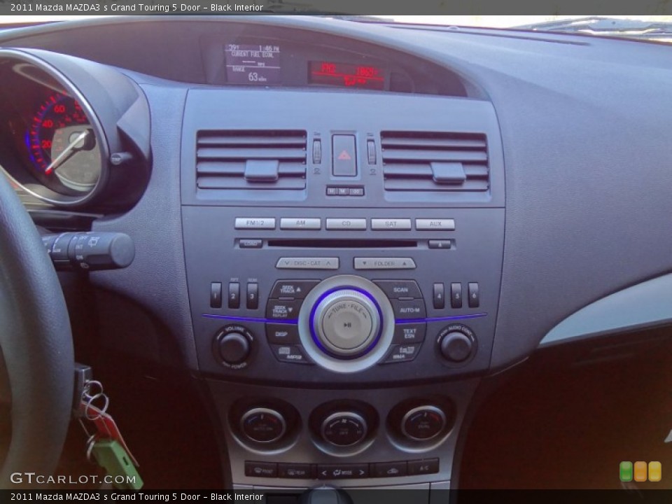 Black Interior Controls for the 2011 Mazda MAZDA3 s Grand Touring 5 Door #59462270