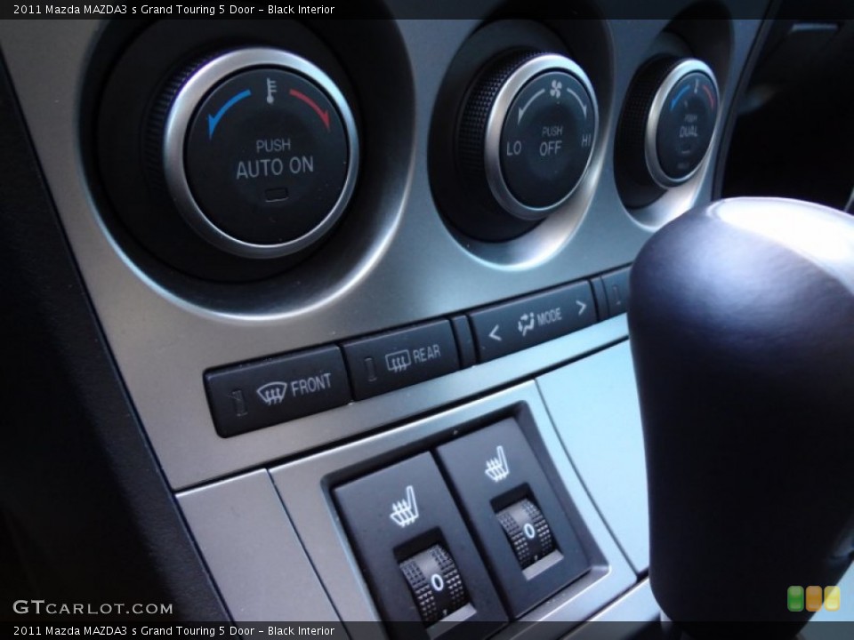 Black Interior Controls for the 2011 Mazda MAZDA3 s Grand Touring 5 Door #59462294