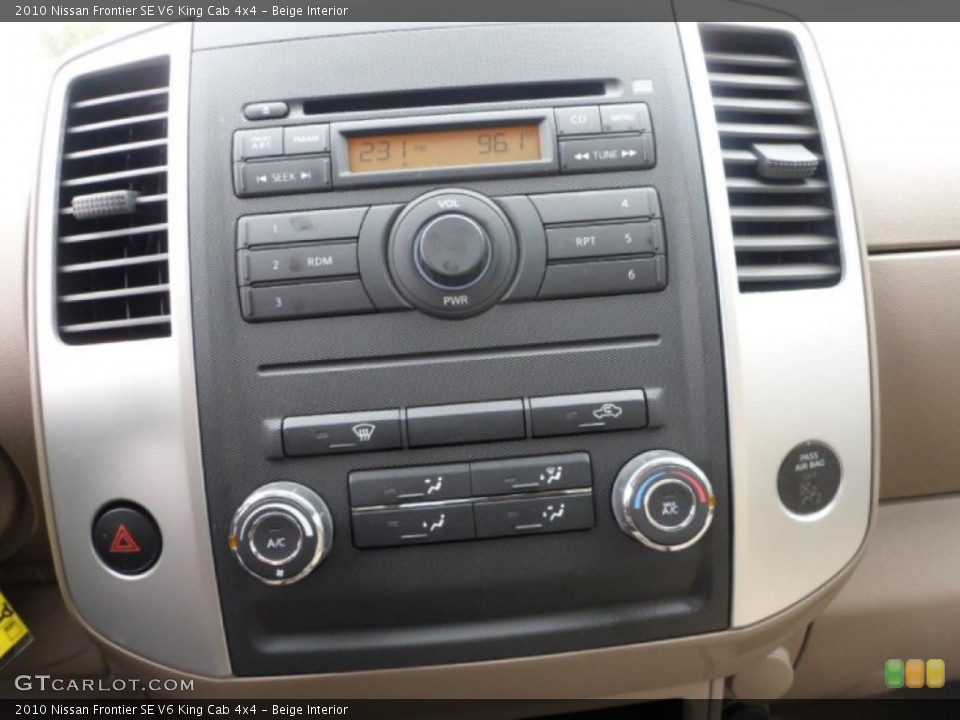 Beige Interior Controls for the 2010 Nissan Frontier SE V6 King Cab 4x4 #59473409