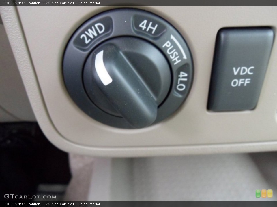 Beige Interior Controls for the 2010 Nissan Frontier SE V6 King Cab 4x4 #59473437