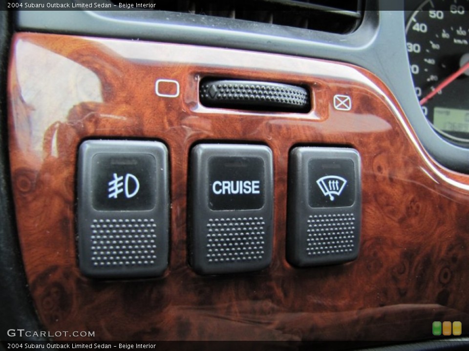 Beige Interior Controls for the 2004 Subaru Outback Limited Sedan #59480923