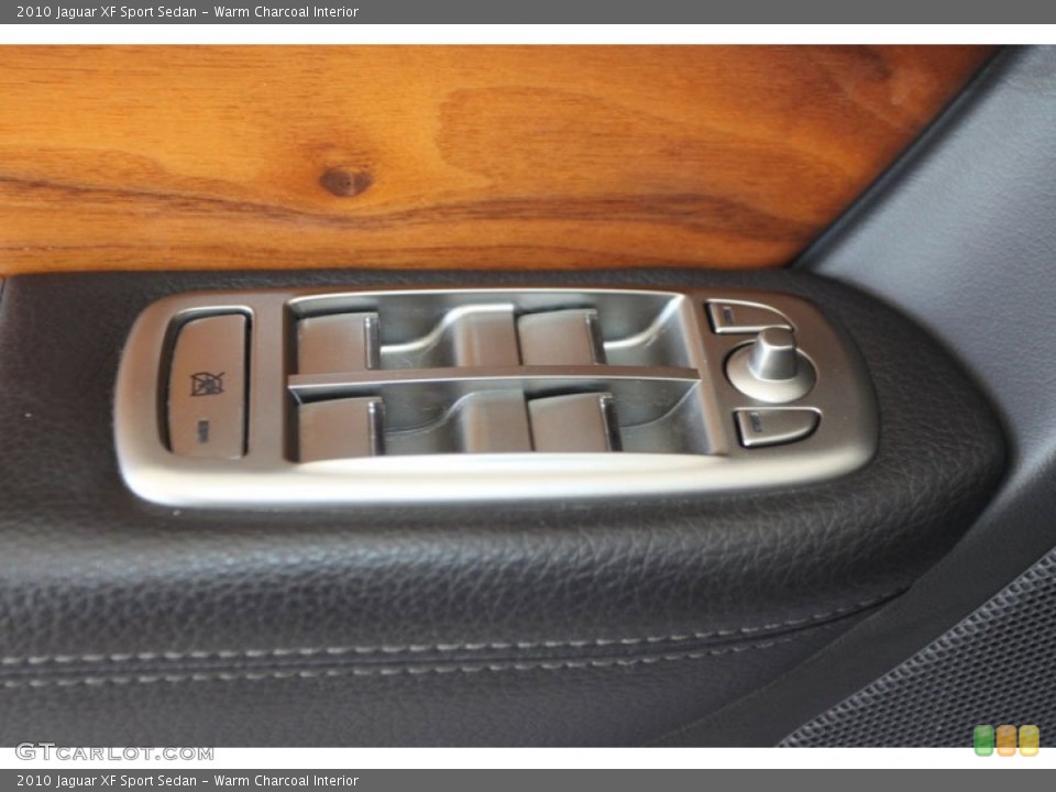 Warm Charcoal Interior Controls for the 2010 Jaguar XF Sport Sedan #59511189