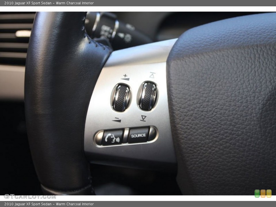 Warm Charcoal Interior Controls for the 2010 Jaguar XF Sport Sedan #59511270