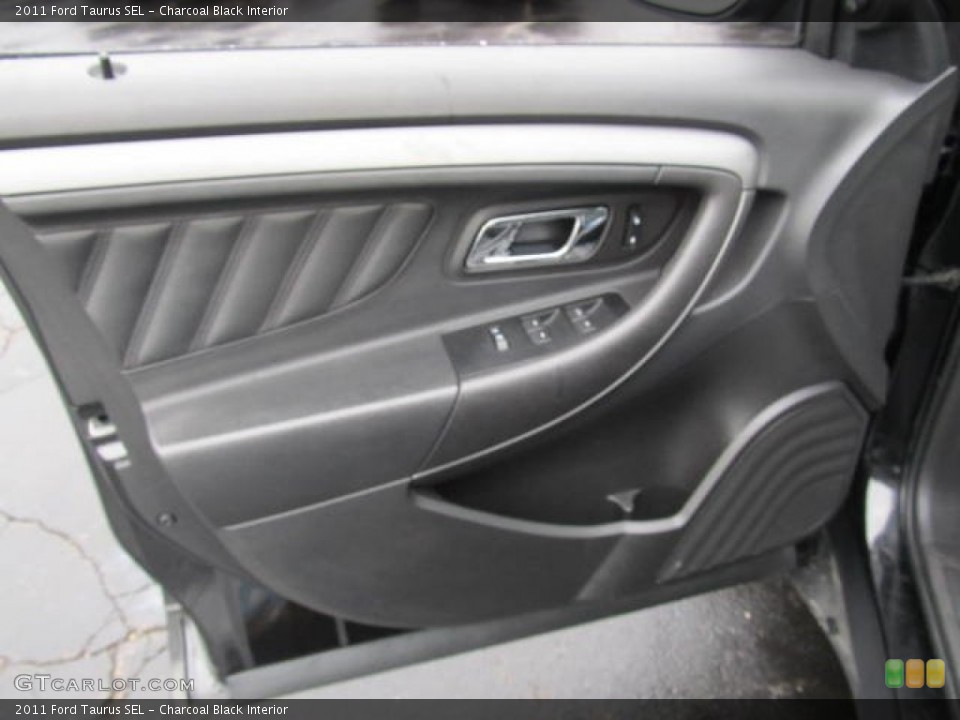 Charcoal Black Interior Door Panel for the 2011 Ford Taurus SEL #59530528