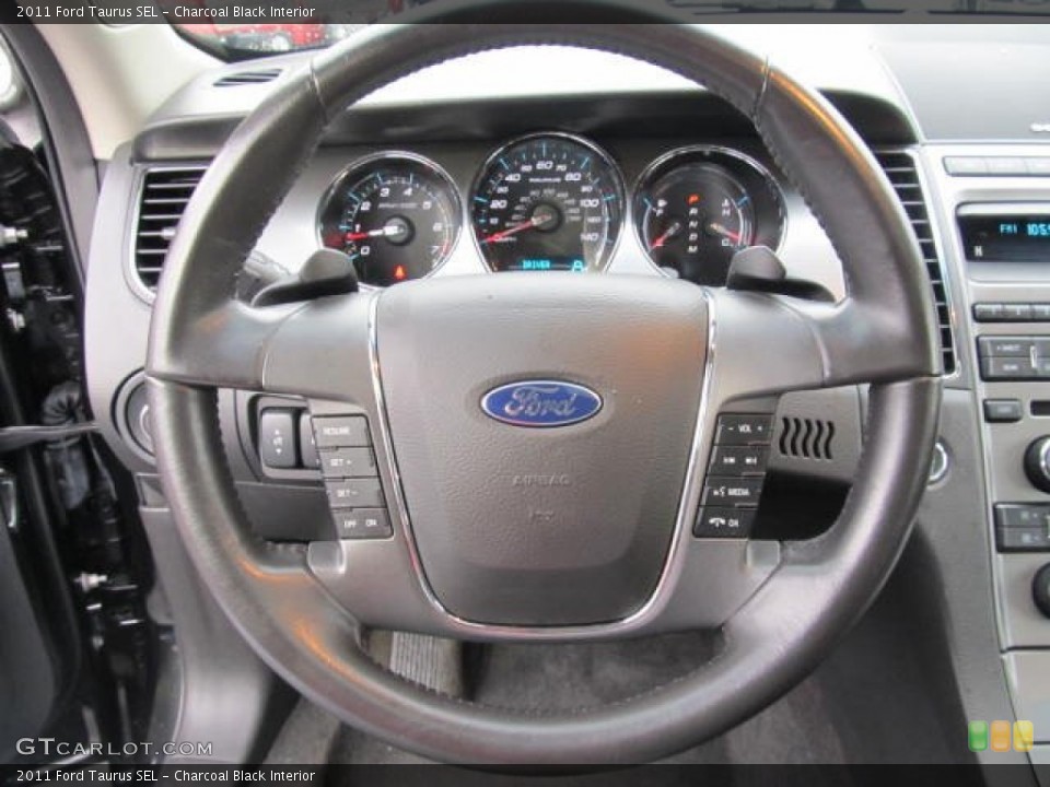 Charcoal Black Interior Steering Wheel for the 2011 Ford Taurus SEL #59530577