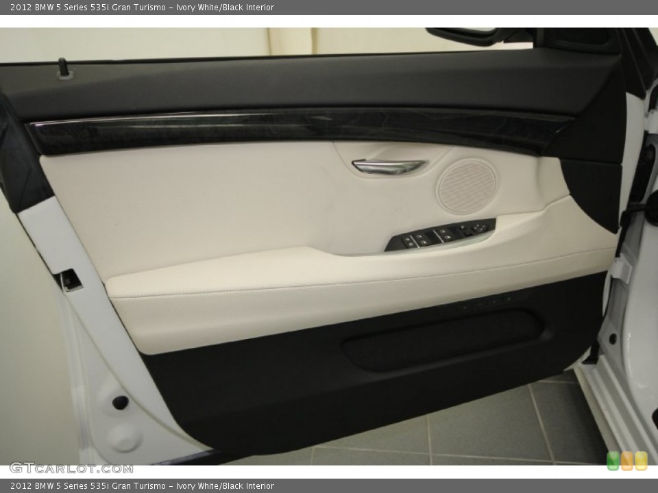 Ivory White/Black Interior Door Panel for the 2012 BMW 5 Series 535i Gran Turismo #59541978