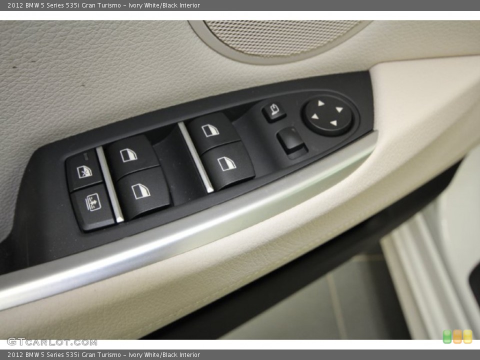 Ivory White/Black Interior Controls for the 2012 BMW 5 Series 535i Gran Turismo #59541987